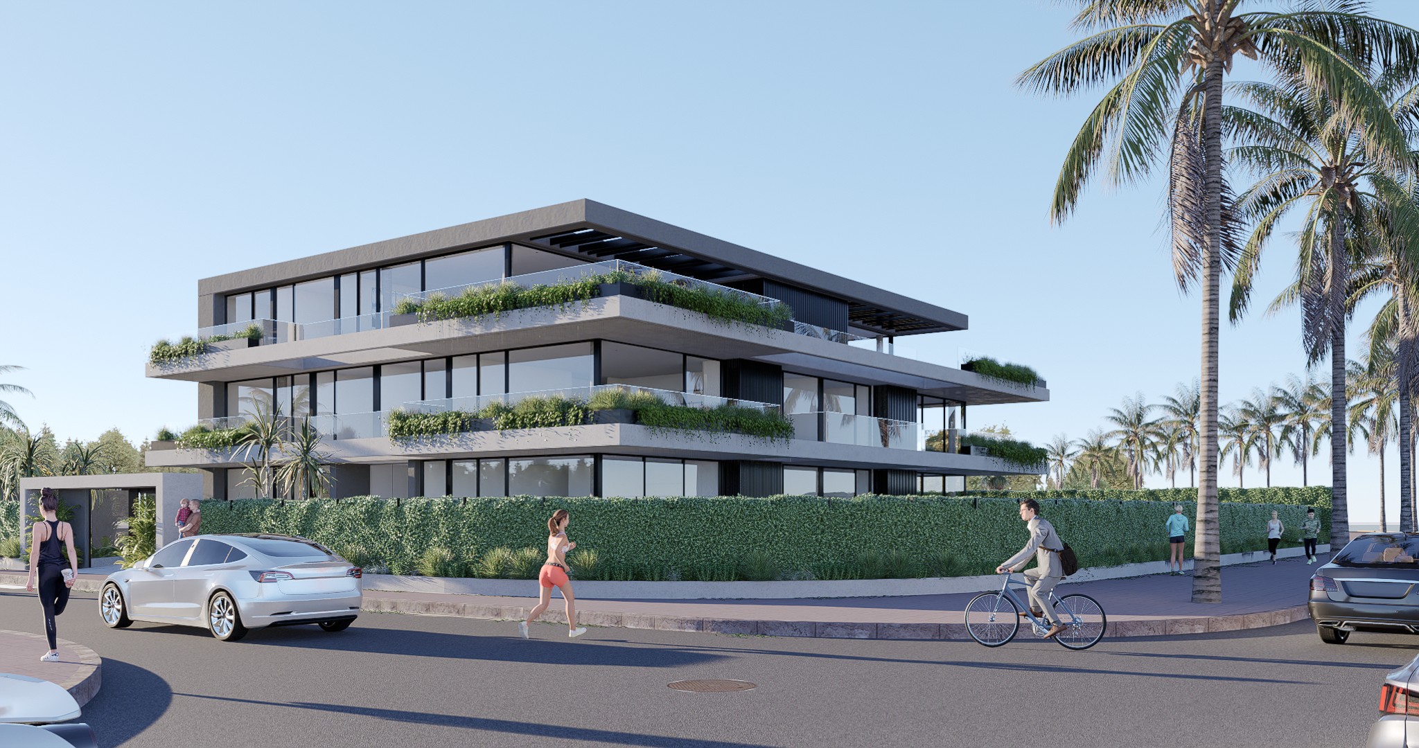 Vista frontal del edificio de apartamentos con terrazas verdes y vegetación integrada