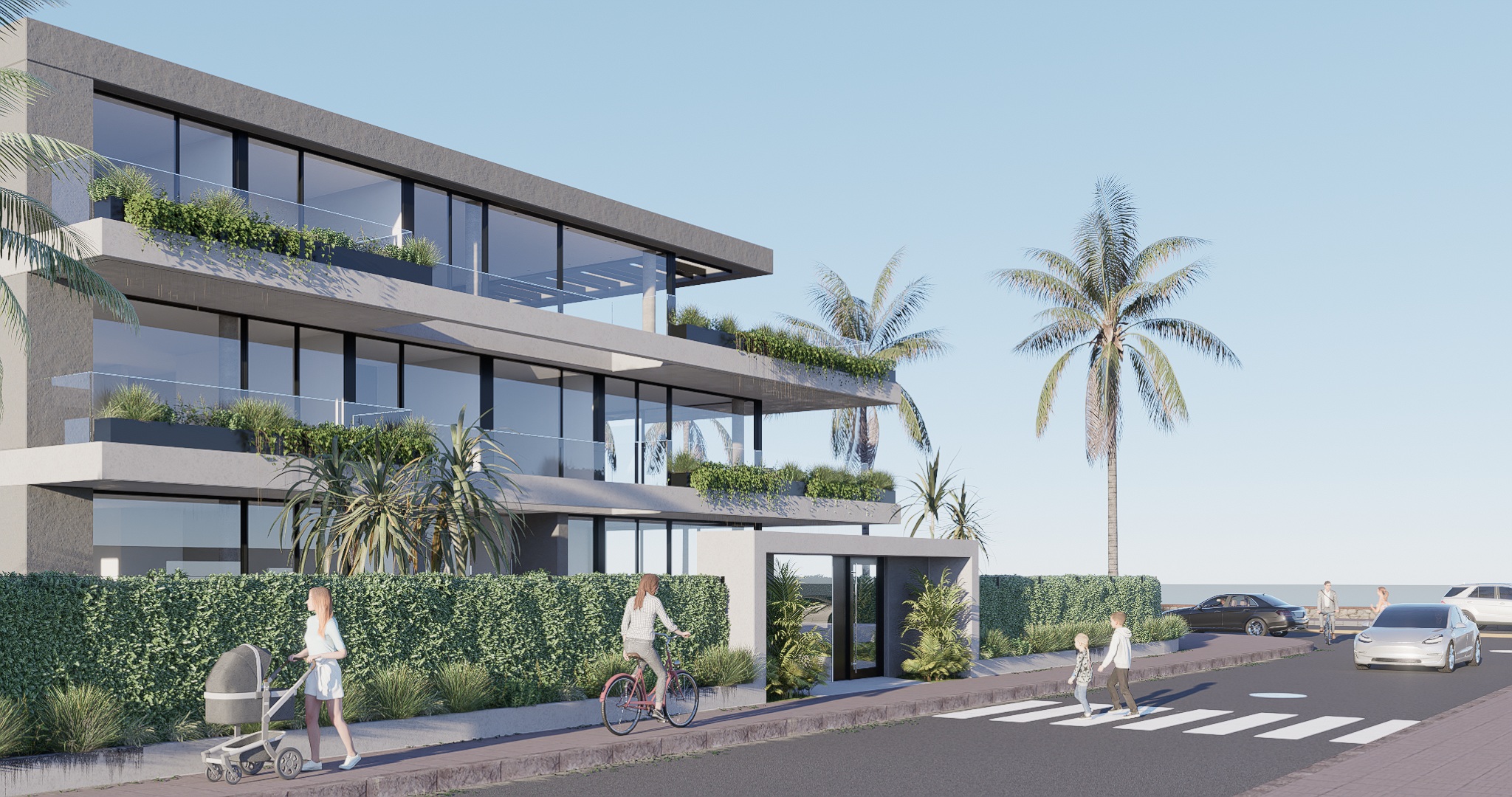 Vista lateral del edificio con la rambla y autos en primer plano