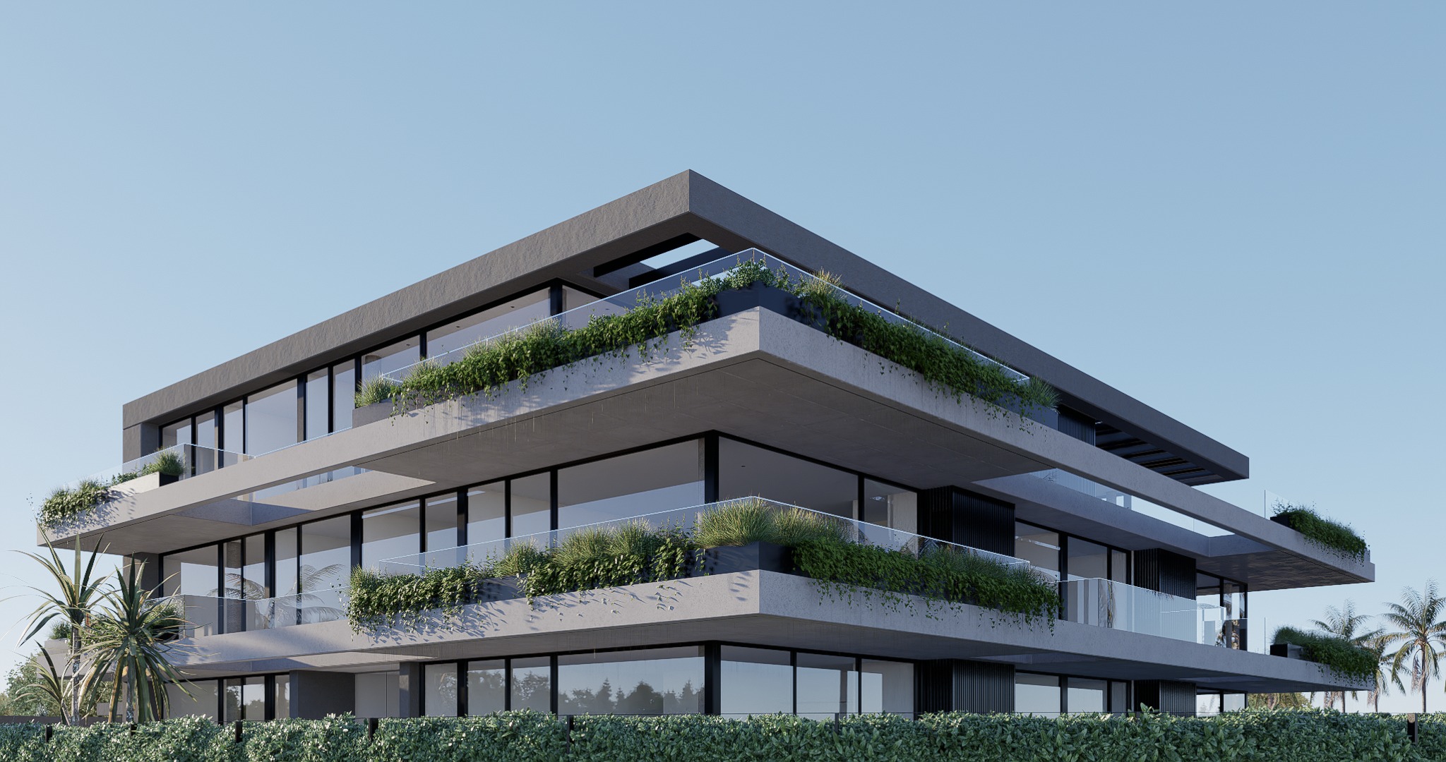 Vista en ángulo del edificio mostrando los detalles arquitectónicos y la vegetación integrada