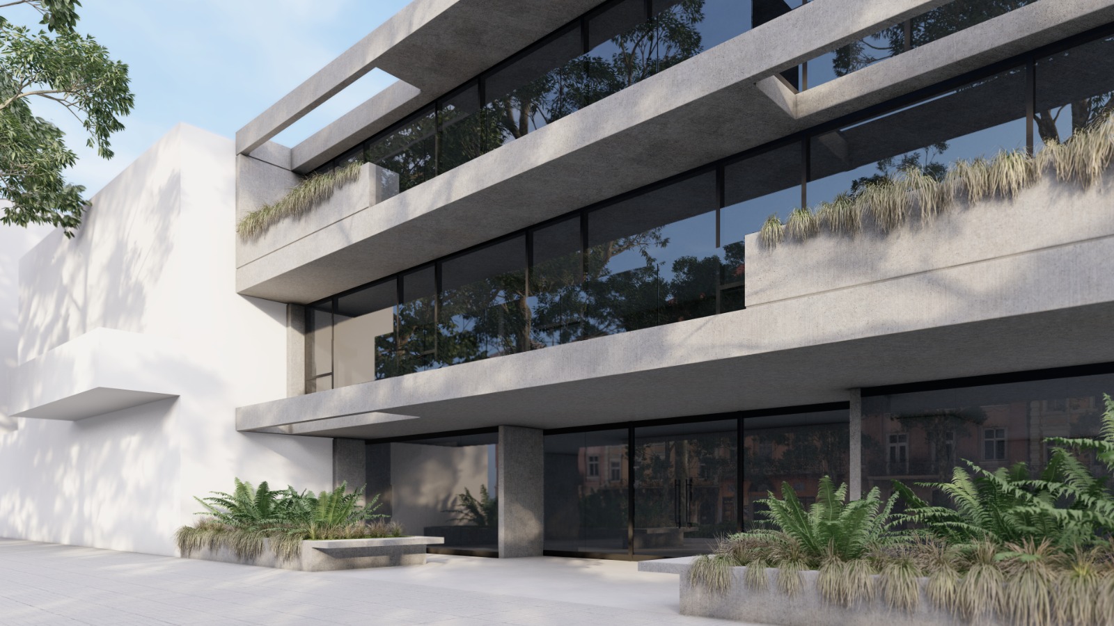 Vista en ángulo del edificio mostrando la arquitectura brutalista con balcones escalonados y vegetación