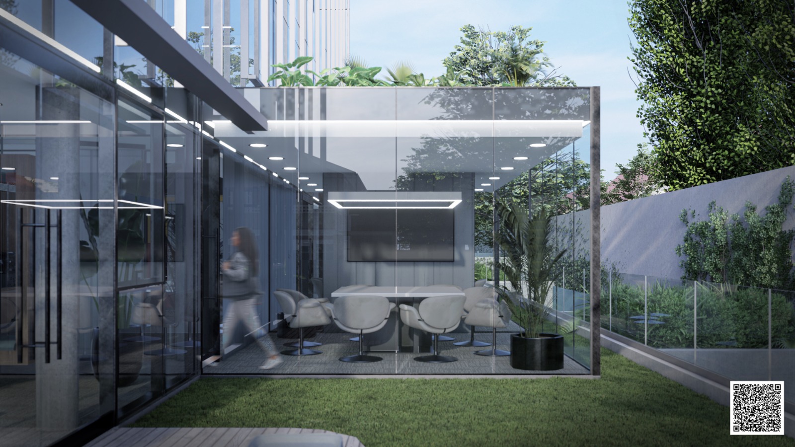 Sala de reuniones con paredes de vidrio que se abre a un área verde exterior