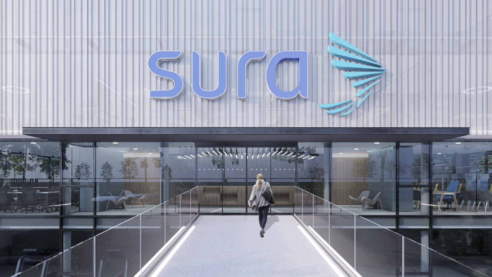 Vista cercana del puente de acceso con el logo de SURA en la fachada