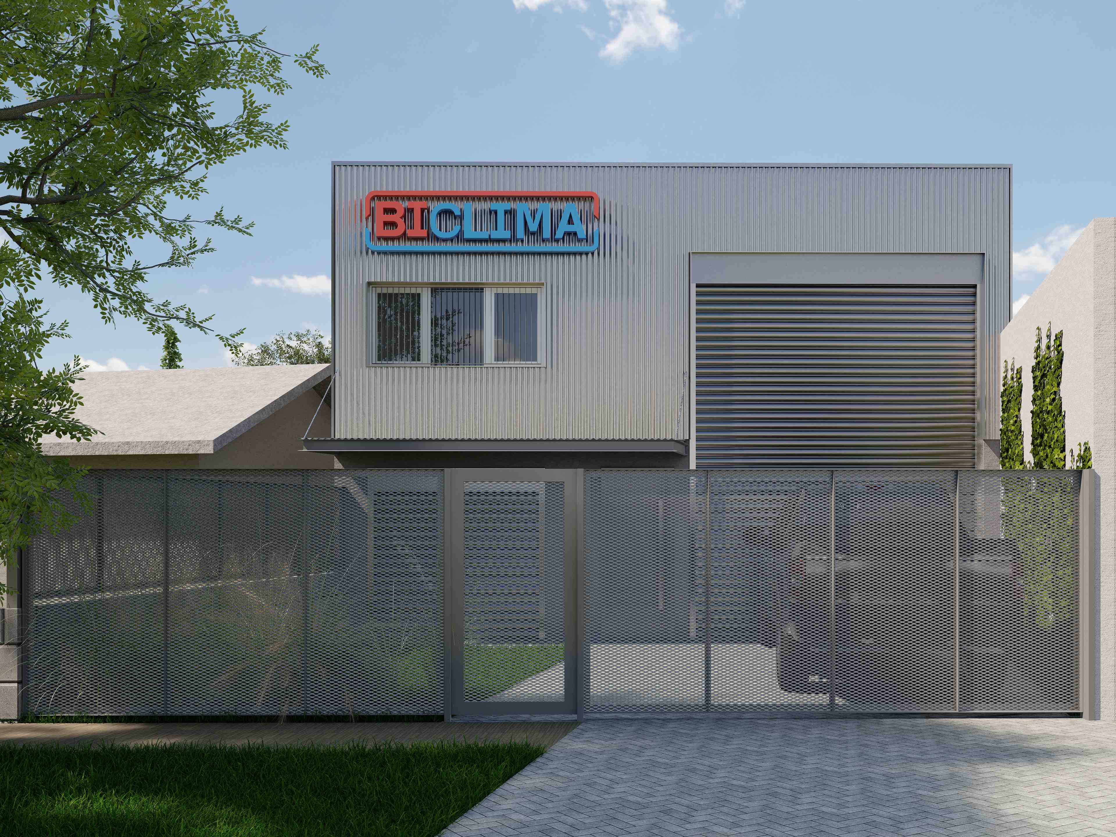 Vista desde la calle con cerco perimetral de malla metálica y acceso peatonal