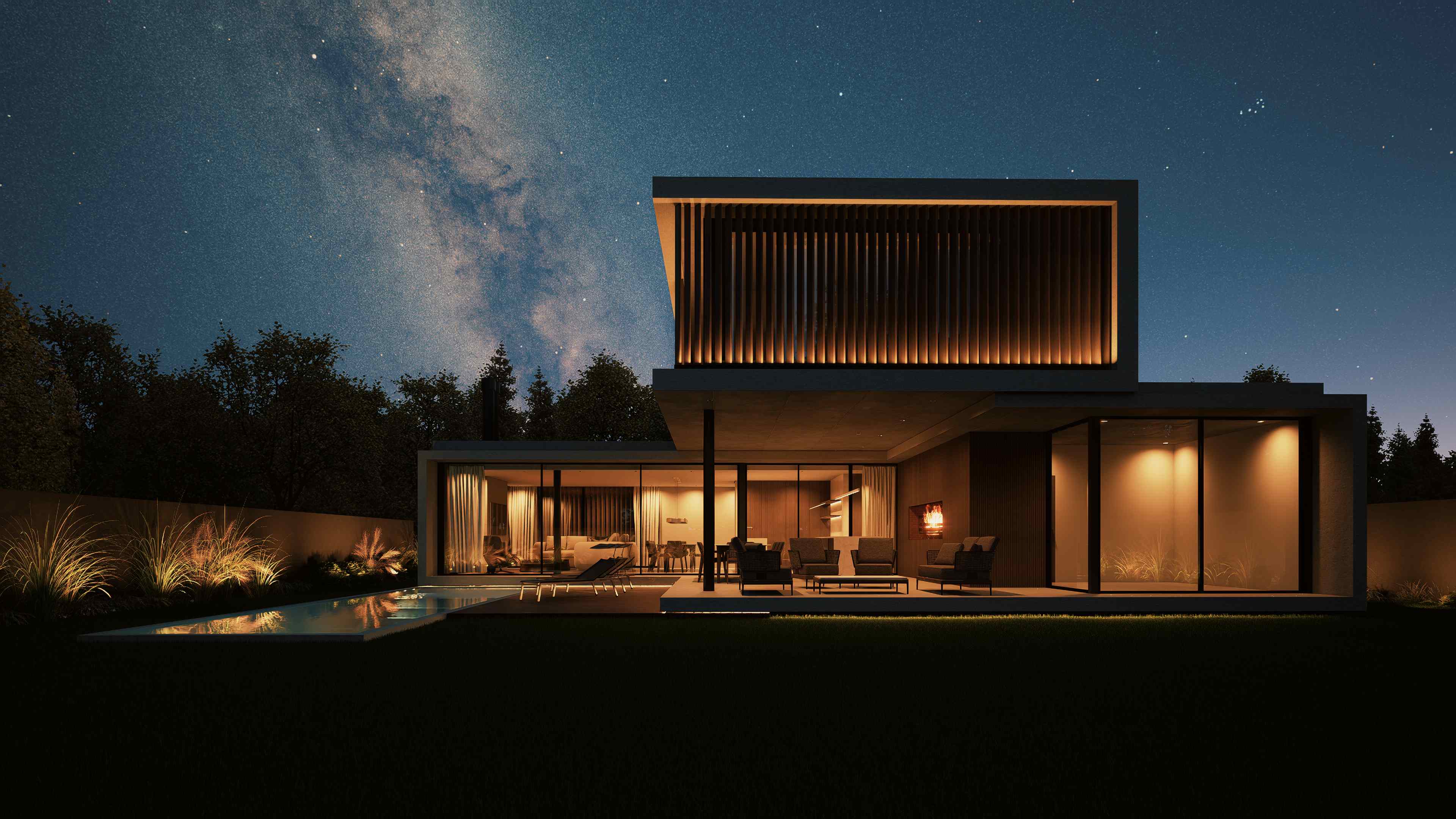 Vista posterior nocturna con cielo estrellado y iluminación arquitectónica